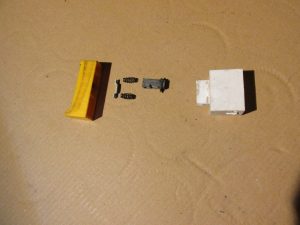 Części pod przyciskiem